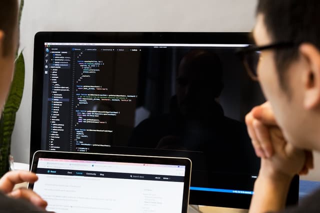 Programmers at a desk